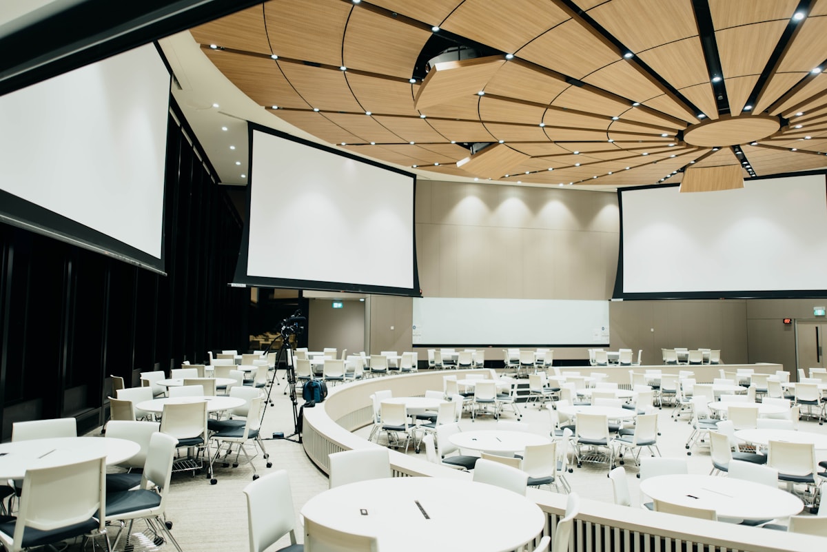 Corporate event audience and production setup